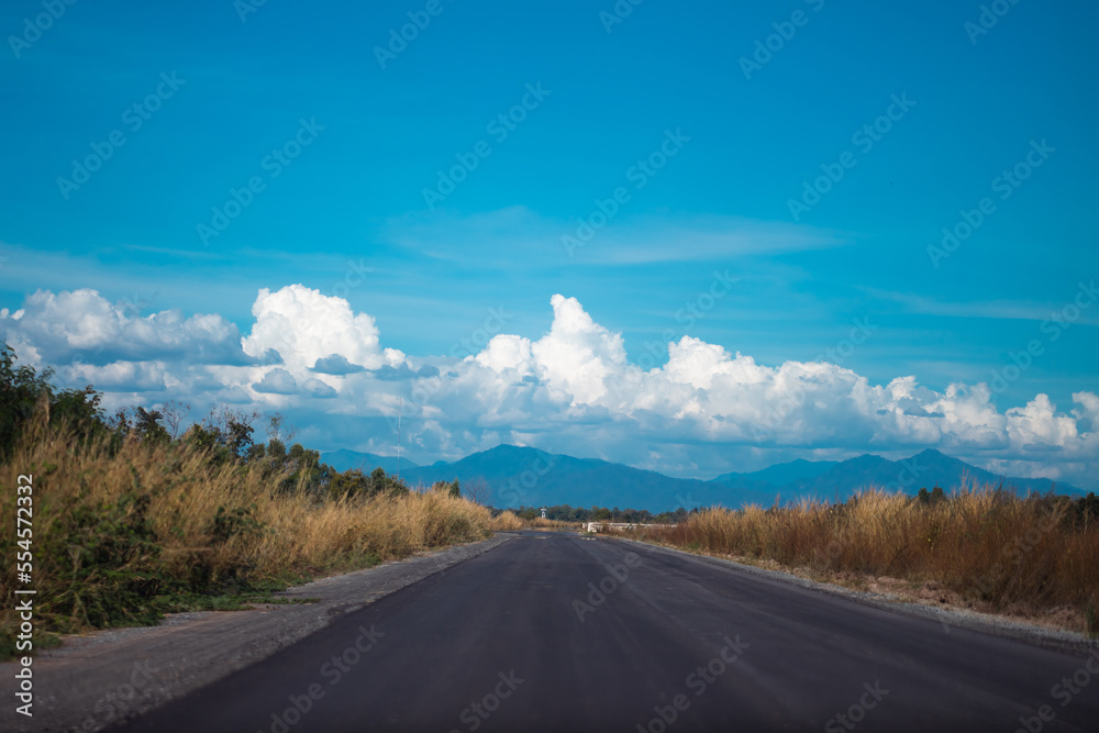 Beautiful countryside on a sunny afternoon Roadside landscape and wonderful sky, countryside scenery