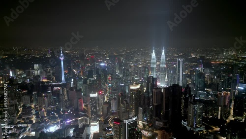 Wallpaper Mural Aerial fly toward KL Tower and KLCC in night Torontodigital.ca