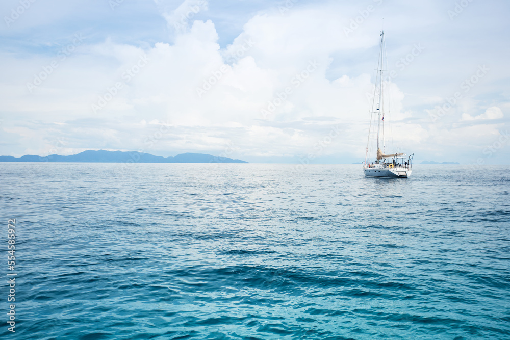 Obraz premium Sailing boat in a sea. Andaman Sea, Thailand. luxury summer adventure, active vacation in Southeast Asia.