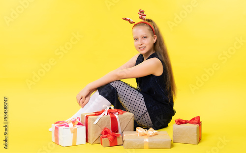 Girl with gifts. Christmas. Studio © Ольга Новицкая