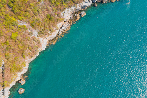 Top view of beautiful turquoise sea water surface texture background