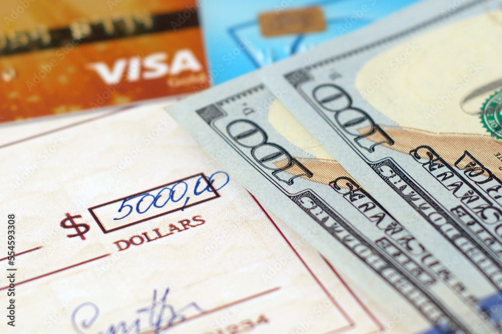 bank check, cash money, debit and credit bank card on table, various types of payments, prepare writing a check, closeup bank check, cash money, debit and credit bank card on table, various types of payments, prepare writing a check, closeup