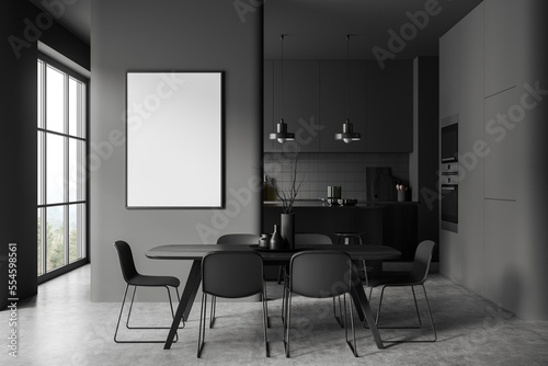 Grey kitchen interior with dining table and countertop near window. Mockup frame