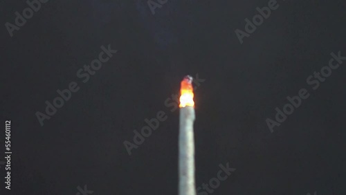 Sparkler pyrotechnics with black background in slow motion 1000 fps. Sparkling new years eve party, festive pyro for video or effect use for sprakling glimming golden effect. photo