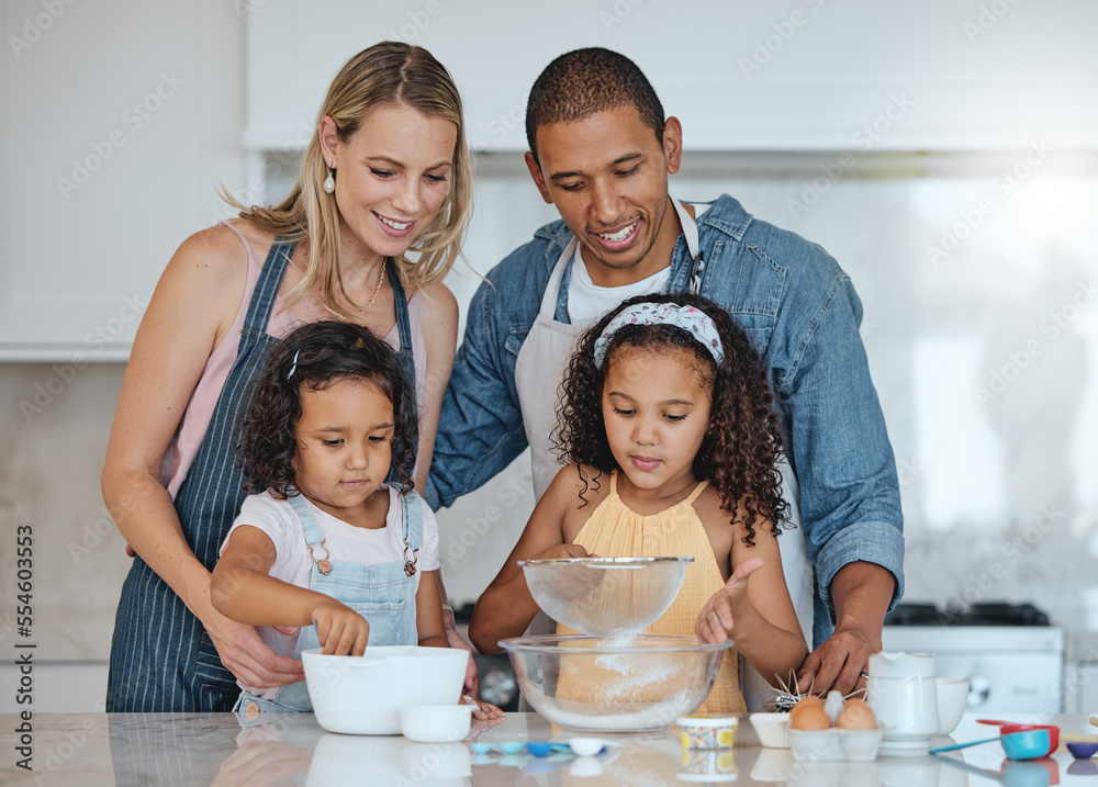Cooking, interracial and family with kids in kitchen learning breakfast recipe with flour. Bonding, wellness and mom with dad in family home teaching food preparation lesson to children. Cooking, interracial and family with kids in kitchen learning breakfast recipe with flour. Bonding, wellness and mom with dad in family home teaching food preparation lesson to children.