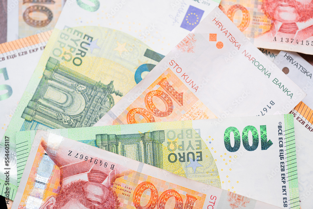 Obraz premium Euro banknotes and Croatian Kuna. Concept showing Croatia's accession to the Eurozone