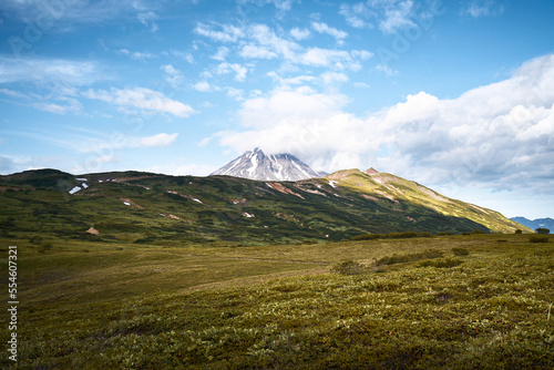 Summer landscape. Vilyuchinsky volcano against blue sky. Kamchatka peninsula © Mikhail Mishchenko