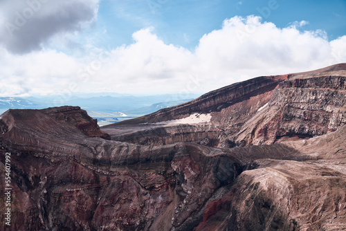 Edge of the Gorely volacano's crater. Deserted landscape of Kamchtaka, Russia photo