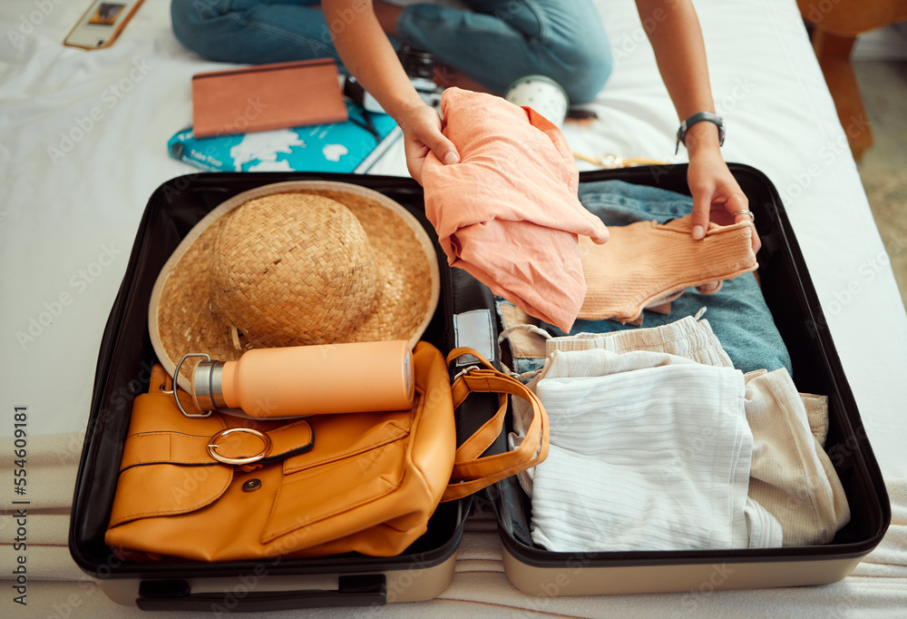 Hands, woman and suitcase on a bed for travel, adventure and summer  vacation, packing and clothing.