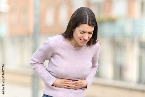 Free Download Teen suffering stomach ache - GFXLoad