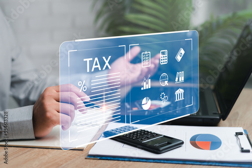 Фотография Financial research, government taxes and calculation tax return concept, Busines