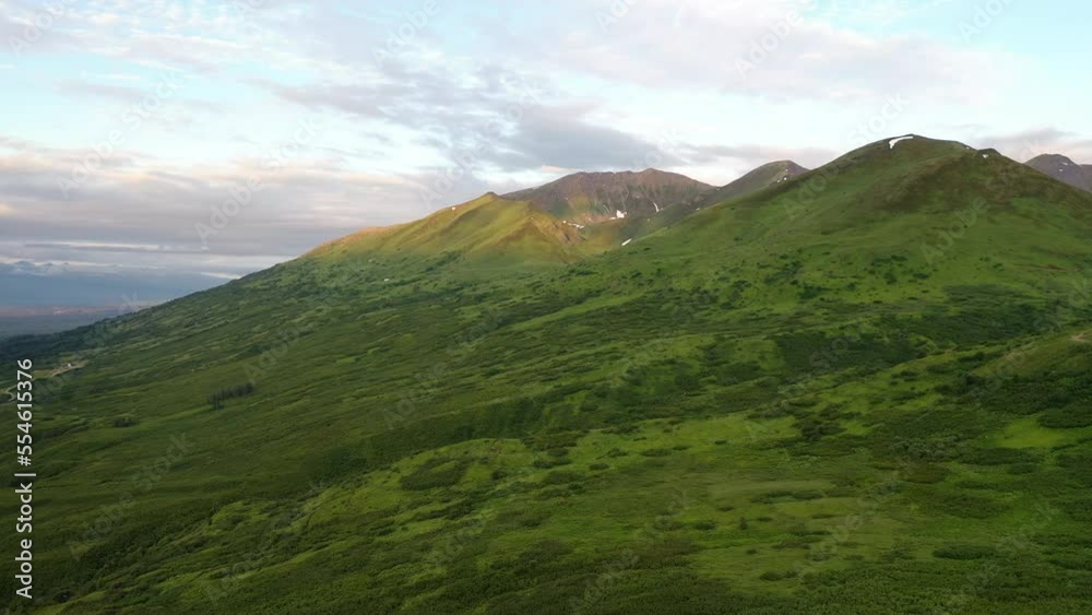 Aerial view of Hatcher Pass, Alaska. Mountain pass through the Talkeetna Mountains from above. Summer Alaskan landscape Aerial view of Hatcher Pass, Alaska. Mountain pass through the Talkeetna Mountains from above. Summer Alaskan landscape