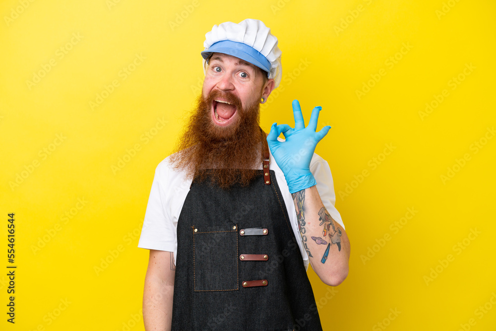 Fishmonger wearing an apron isolated on yellow background showing ok sign with fingers