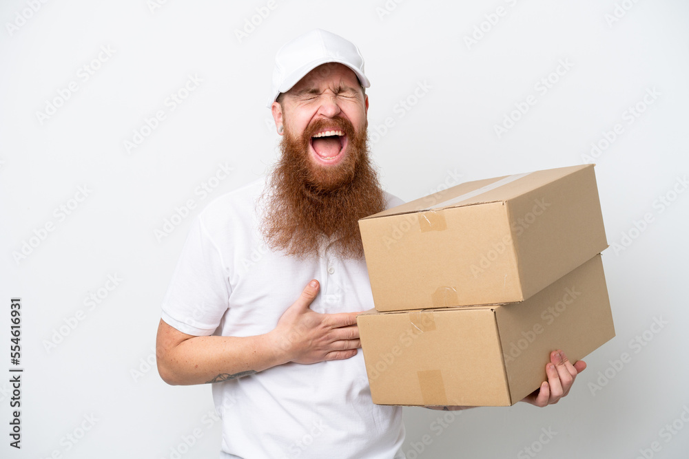 Delivery reddish man isolated on white background smiling a lot Delivery reddish man isolated on white background smiling a lot