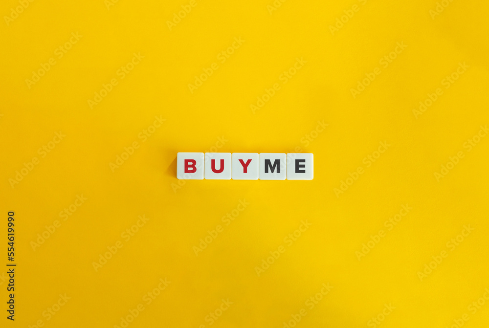 Buy Me. Block Letter Tiles on Yellow Background. Minimal Aesthetics. Buy Me. Block Letter Tiles on Yellow Background. Minimal Aesthetics.