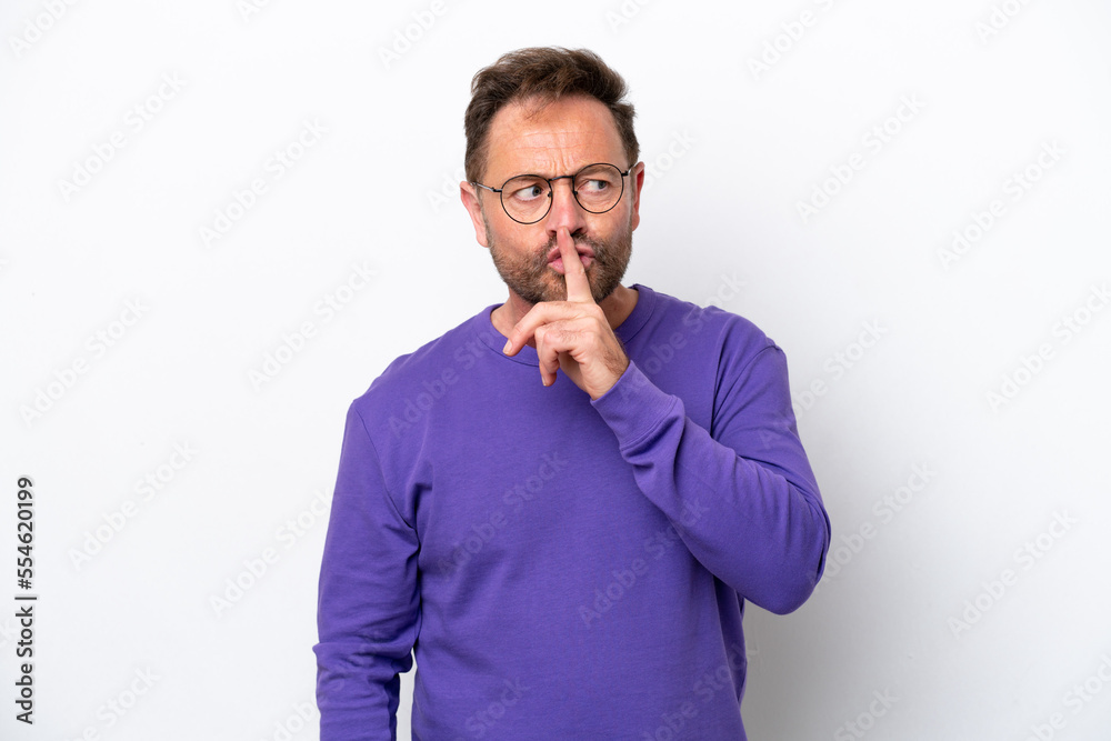 Middle age caucasian man isolated on white background showing a sign of silence gesture putting finger in mouth Middle age caucasian man isolated on white background showing a sign of silence gesture putting finger in mouth