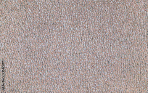 Texture and background of light brown leatherette. Leather pattern texture as background and design element. Leather background for design development