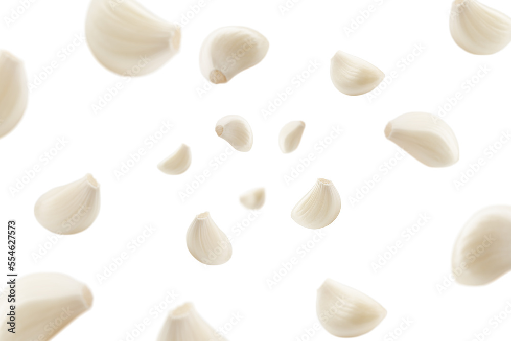 Falling garlic, isolated on white background, selective focus