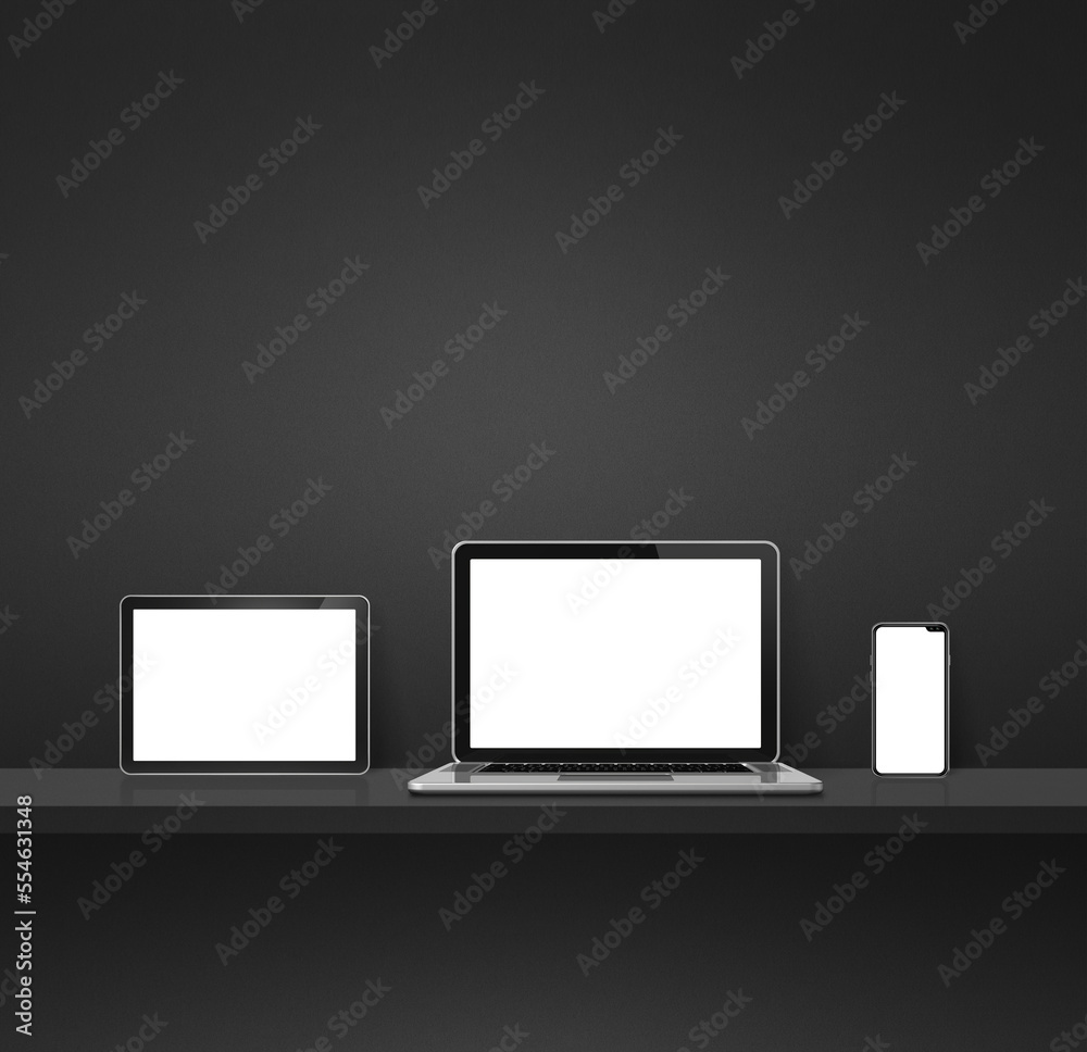 Laptop, mobile phone and digital tablet pc on black wall shelf. Square background Laptop, mobile phone and digital tablet pc on black wall shelf. Square background