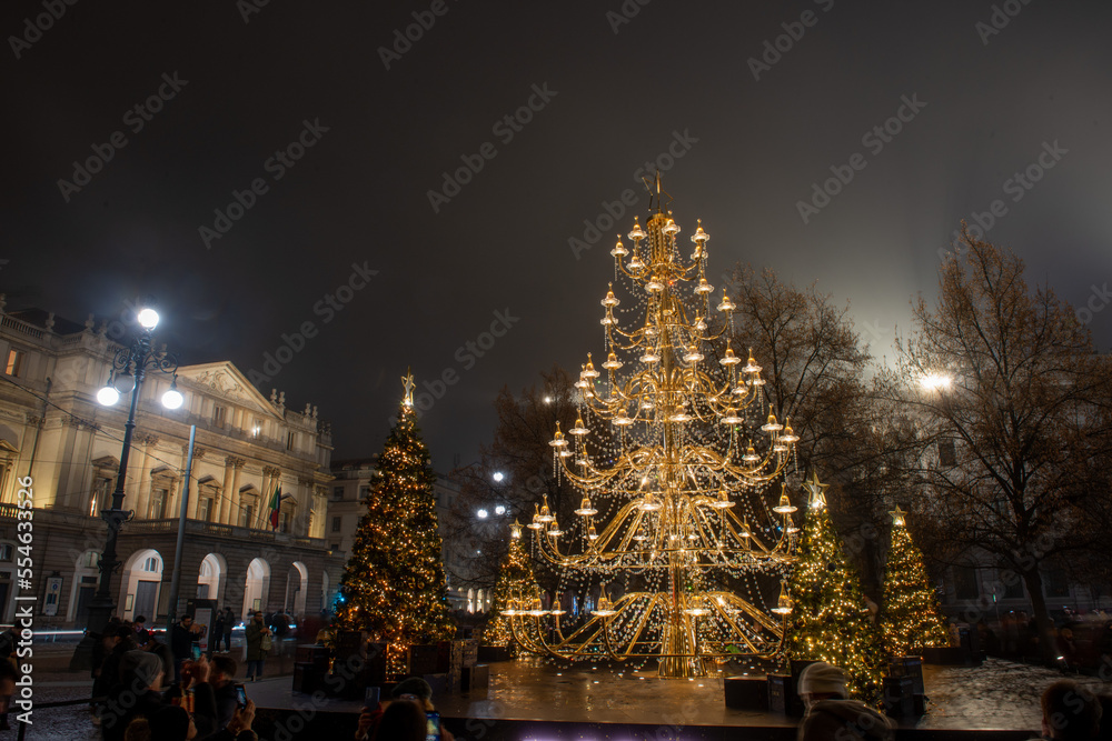 Illuminated Christmas tree in front of the Scala theater in Milan Illuminated Christmas tree in front of the Scala theater in Milan