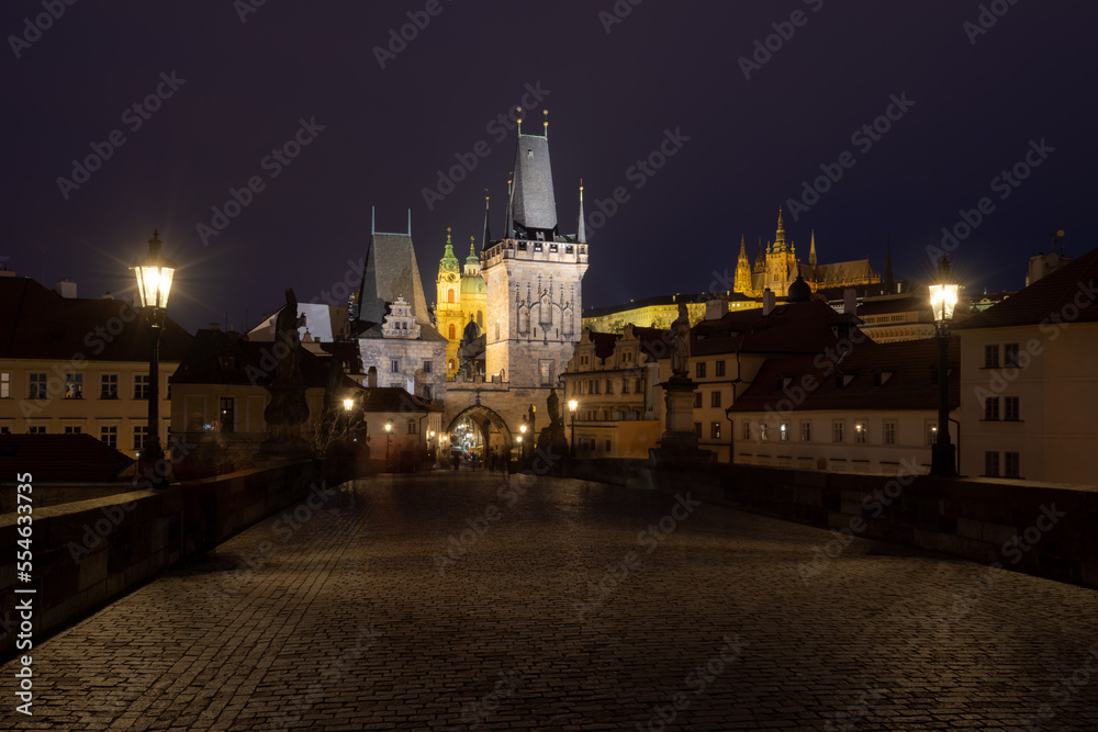 Charles bridge at night. The Bridge and the towers in gothic style. Charles Bridge are the symbols of Czech capital, built in medieval times