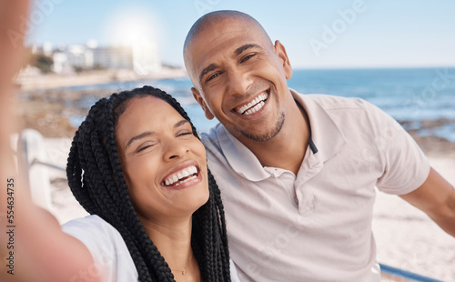 Holiday selfie, happy and black couple at the beach, honeymoon peace and relax by the ocean in Puerto Rico. Memory, smile and portrait of an excited man and woman with a photo on vacation by the sea