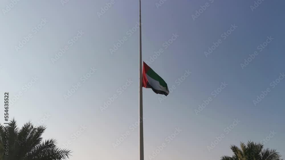 UAE national flag fly at half mast. The Flag halfmast as a sign of