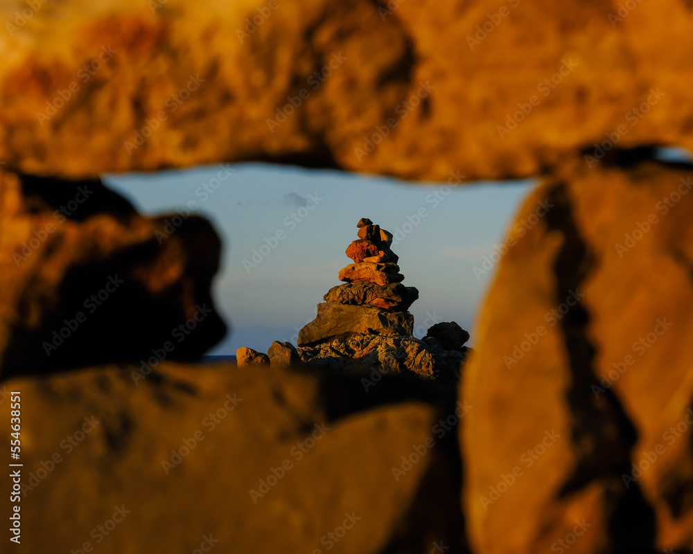 Fototapeta premium Artificial stone sculpture photographed through stone window