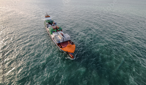 Impressive aerial wide angle view of a container ship crossing the oceans © Image'in