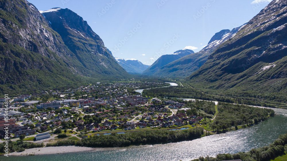 Aerial view of Sunndalsøra village in Norway, surrounded by beautiful mountains