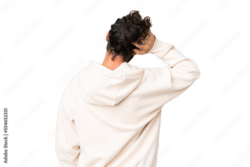 Young man with beard over isolated chroma key background in back position and thinking Young man with beard over isolated chroma key background in back position and thinking