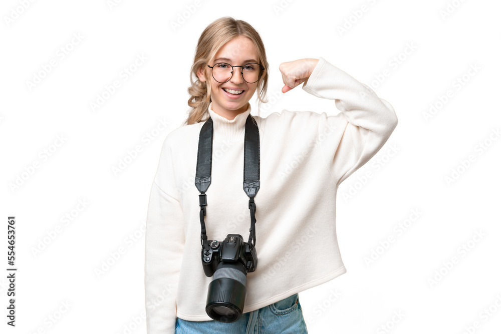 Young photographer English woman over isolated background doing strong gesture Young photographer English woman over isolated background doing strong gesture