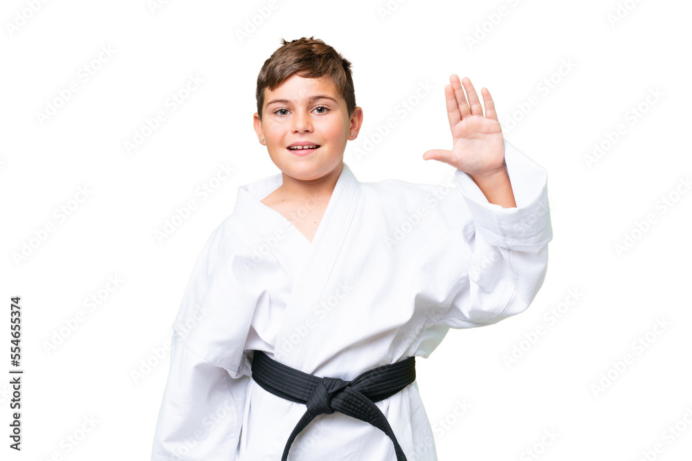 Little caucasian kid over isolated chroma key background saluting with hand with happy expression Little caucasian kid over isolated chroma key background saluting with hand with happy expression