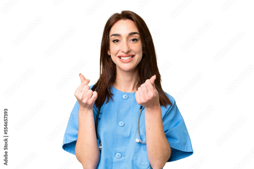 Young nurse woman over isolated chroma key background making money gesture Young nurse woman over isolated chroma key background making money gesture