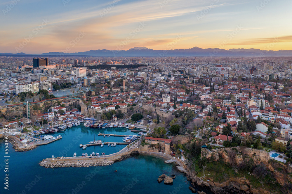 Aerial view of marina and Old Town (Kaleichi) at sunrise, Turkey. Aerial view of marina and Old Town (Kaleichi) at sunrise, Turkey.