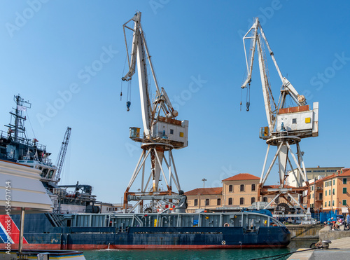 Work boat and dock cranes