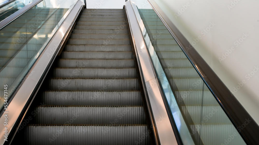 Stairs escalator close up inside modern building Stairs escalator close up inside modern building