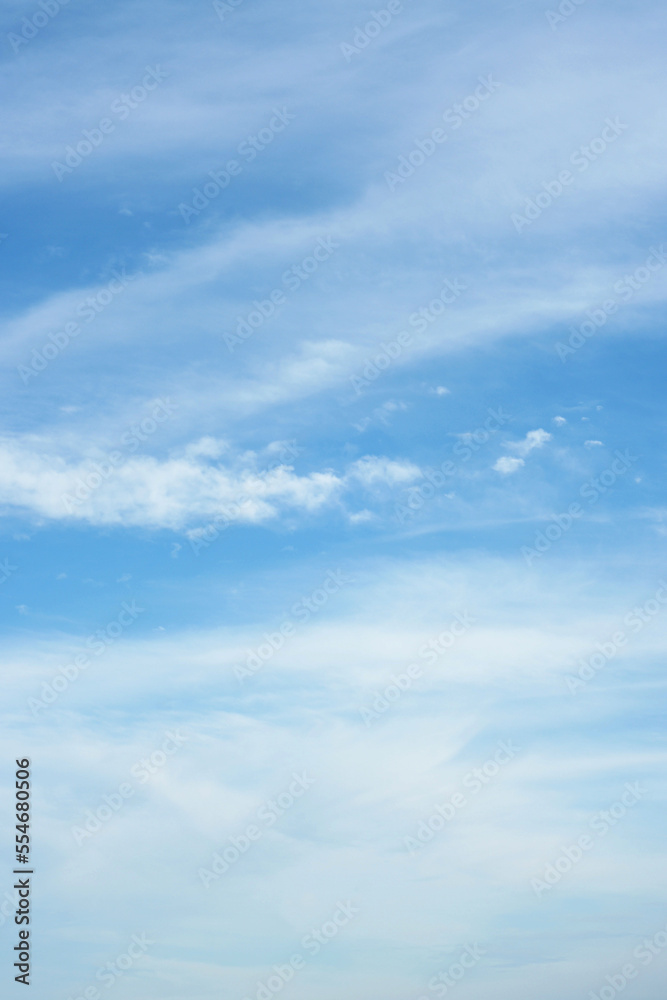 Blue sky with clouds, for backgrounds or textures