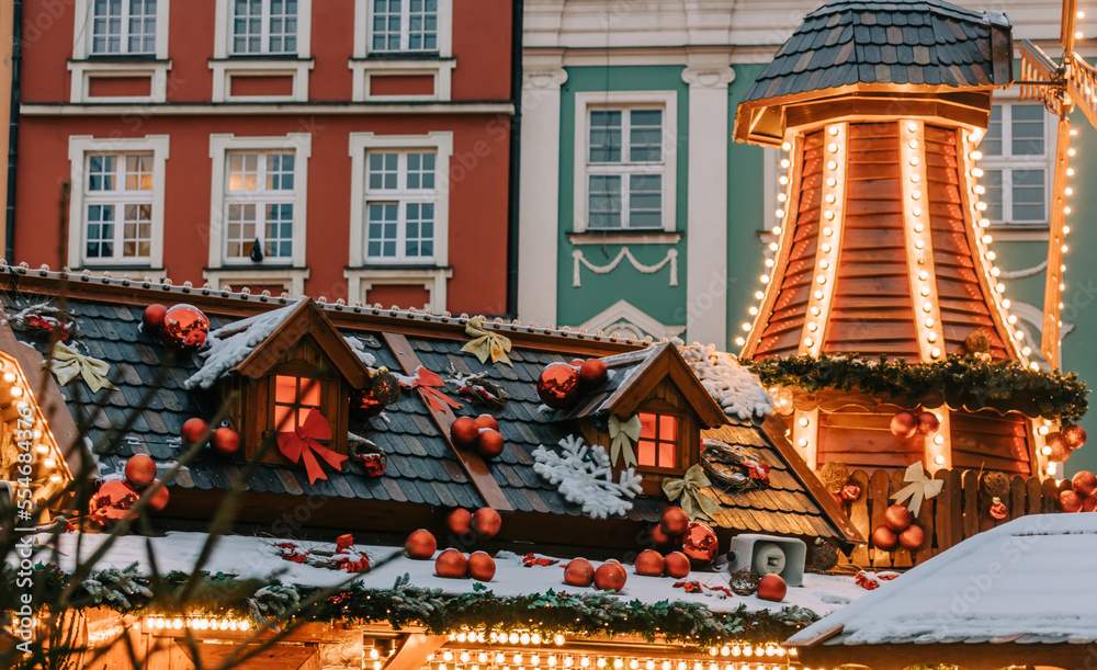 Street illumination on roof of Christmas fair in Wroclaw, Poland