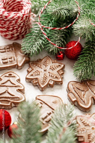 Christmas gingerbread cakes among the festive decor. New Year's traditional pastries closeup 