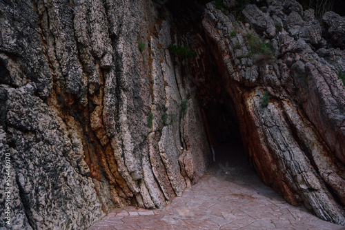 Crevice in the layered stone of the rock.