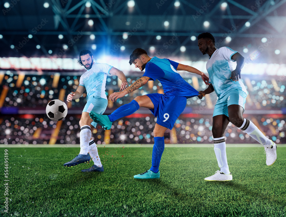 Fototapeta premium Football scene with competing football players at the full stadium