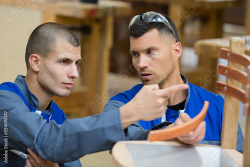two artisans having a discussion