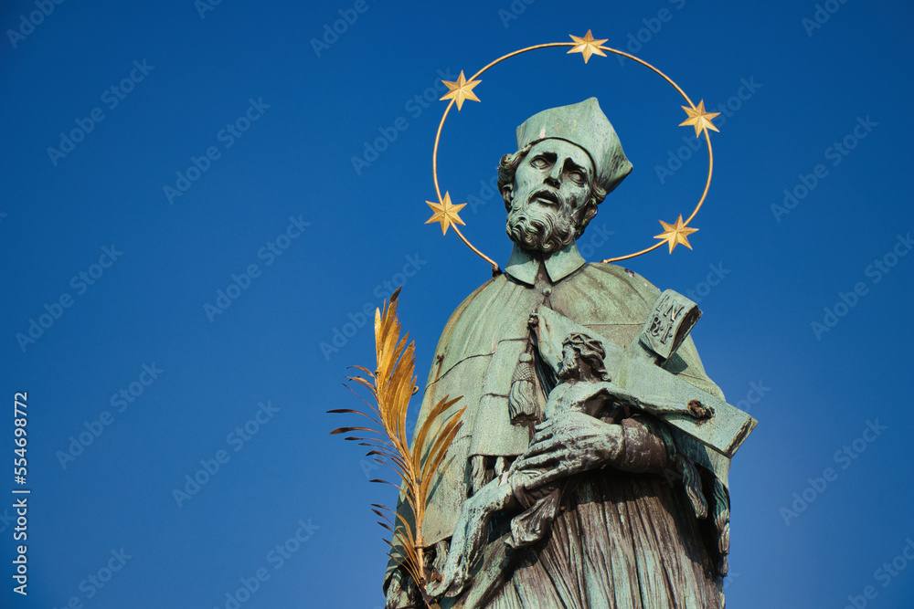 Fototapeta premium Statue of St. John of Nepomuk on Charles bridge, Prague. Czech Republic.