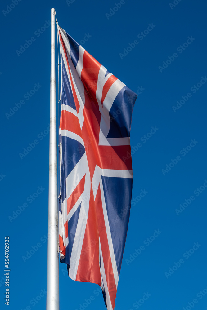 Union Jack flag with blue sky background