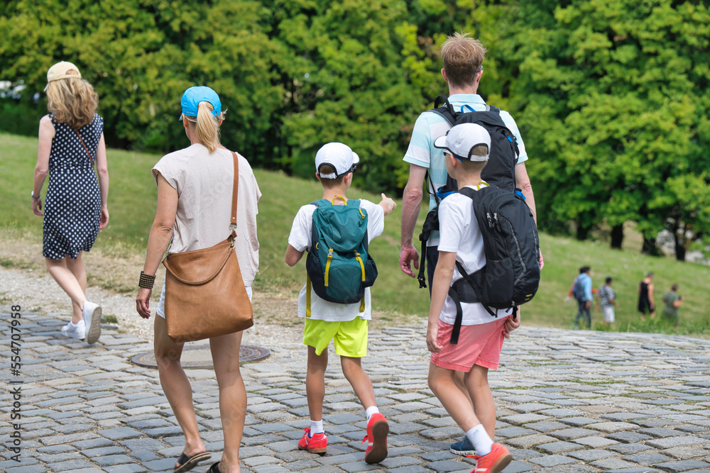 Fototapeta premium group of people walking in the park