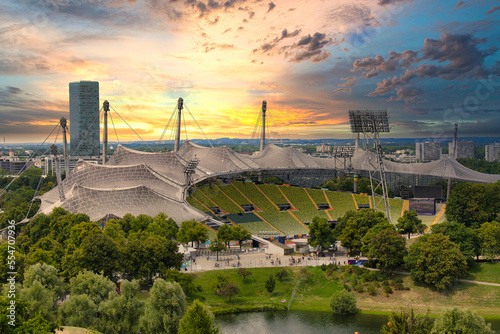View of the Olympic Stadium in the evening, Munich, Bavaria, Germany outlook, cloud, cloudy, foggy, olympic games, sunshine, overview, on, look, topview, european, up, town, city park, sunset photo