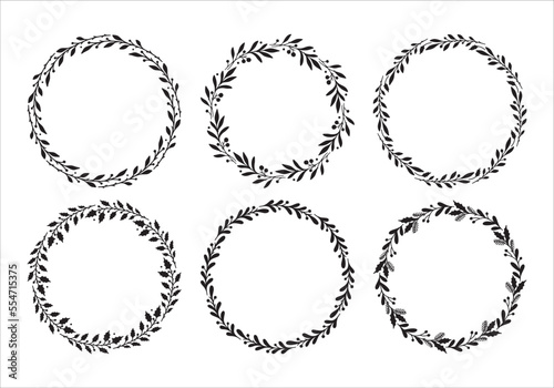 Set of hand drawn Christmas wreaths. Round floral frames for invitations, posters, greeting cards, web, frame art.