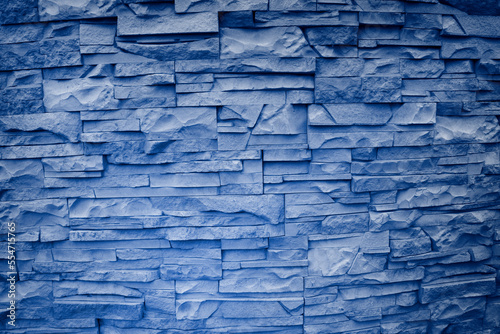 Texture of blue decorative tiles in form of brick. Background of blue bricks.