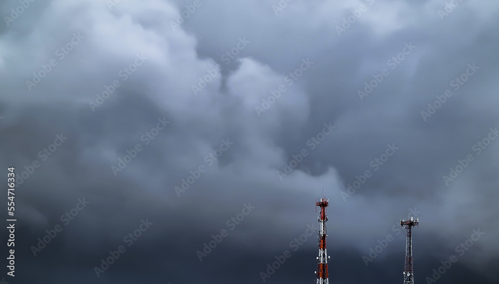 Rainy cloudy dark sky with telecommunication tower in Brazil